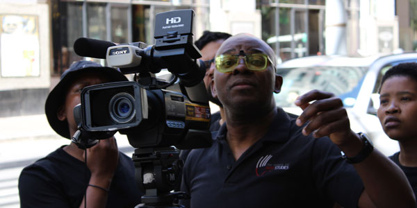Nenio Mbazima is the project lead of the Film Production Internship for Deaf youth run by the Centre for Deaf Studies at Wits University Nenio Mbazima is the project lead of the Film Production Internship for Deaf youth run by the Centre for Deaf Studies at Wits University
